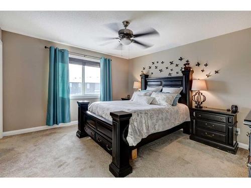 151 Ravenscroft Green Se, Airdrie, AB - Indoor Photo Showing Bedroom