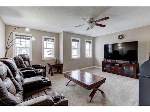 151 Ravenscroft Green Se, Airdrie, AB - Indoor Photo Showing Living Room