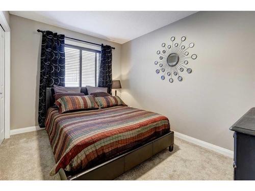 151 Ravenscroft Green Se, Airdrie, AB - Indoor Photo Showing Bedroom