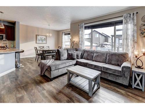 151 Ravenscroft Green Se, Airdrie, AB - Indoor Photo Showing Living Room