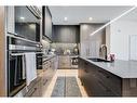 205-835 78 Street Sw, Calgary, AB  - Indoor Photo Showing Kitchen With Upgraded Kitchen 