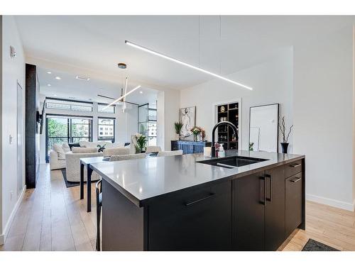 205-835 78 Street Sw, Calgary, AB - Indoor Photo Showing Kitchen With Double Sink With Upgraded Kitchen