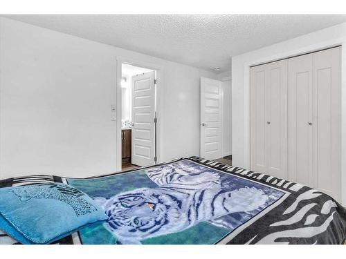 107 Auburn Bay Street Se, Calgary, AB - Indoor Photo Showing Bedroom