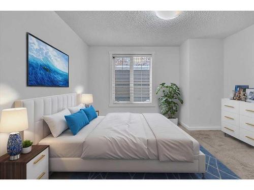 107 Auburn Bay Street Se, Calgary, AB - Indoor Photo Showing Bedroom