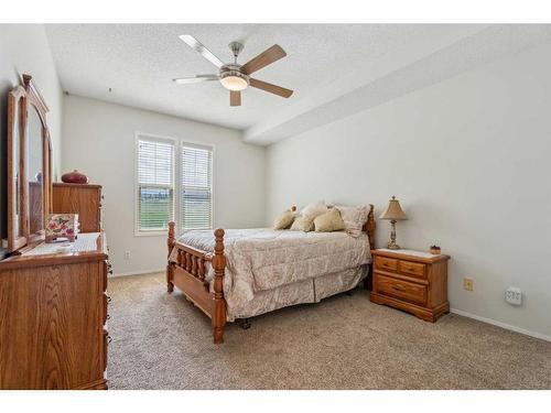 501-39 Hidden Creek Place Nw, Calgary, AB - Indoor Photo Showing Bedroom