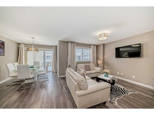 204 Evanston Manor Nw, Calgary, AB - Indoor Photo Showing Living Room With Fireplace