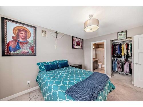 204 Evanston Manor Nw, Calgary, AB - Indoor Photo Showing Bedroom