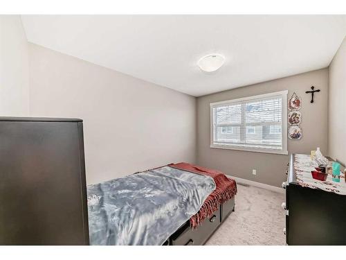 204 Evanston Manor Nw, Calgary, AB - Indoor Photo Showing Bedroom