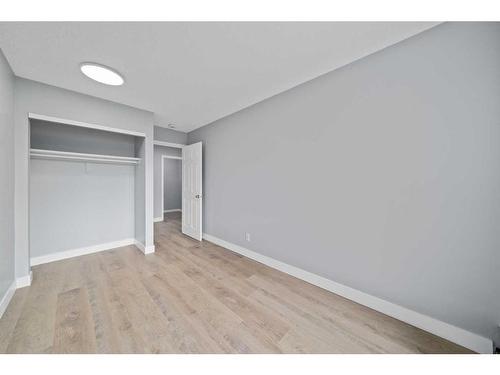 110-1712 38 Street Se, Calgary, AB - Indoor Photo Showing Other Room