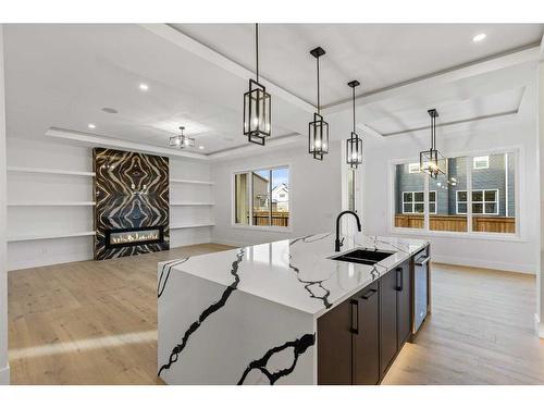 219 Kinniburgh Loop, Chestermere, AB - Indoor Photo Showing Kitchen With Double Sink With Upgraded Kitchen