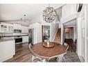 228 Riverglen Drive Se, Calgary, AB  - Indoor Photo Showing Dining Room 