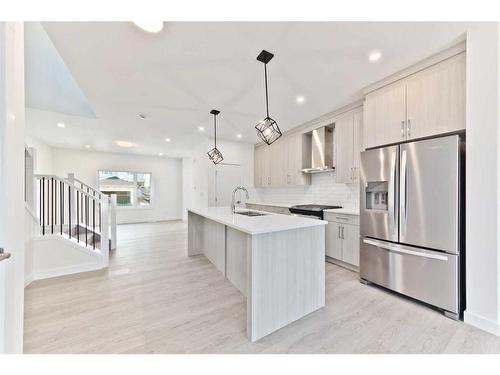 816 Midtown Drive Sw, Airdrie, AB - Indoor Photo Showing Kitchen With Upgraded Kitchen