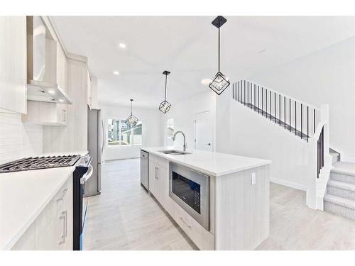 816 Midtown Drive Sw, Airdrie, AB - Indoor Photo Showing Kitchen With Upgraded Kitchen