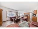 13 Bow Ridge Drive, Cochrane, AB  - Indoor Photo Showing Living Room 