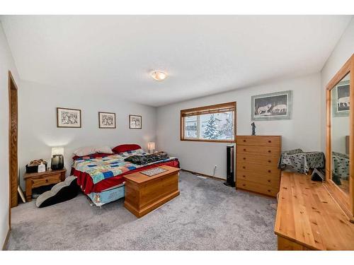 13 Bow Ridge Drive, Cochrane, AB - Indoor Photo Showing Bedroom