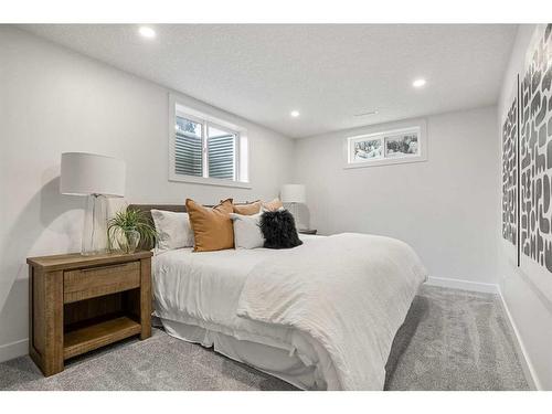 146 Winston Drive Sw, Calgary, AB - Indoor Photo Showing Bedroom