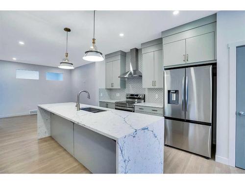 195 Lewiston Drive Ne, Calgary, AB - Indoor Photo Showing Kitchen With Stainless Steel Kitchen With Upgraded Kitchen