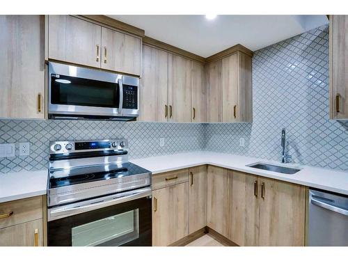 195 Lewiston Drive Ne, Calgary, AB - Indoor Photo Showing Kitchen With Stainless Steel Kitchen