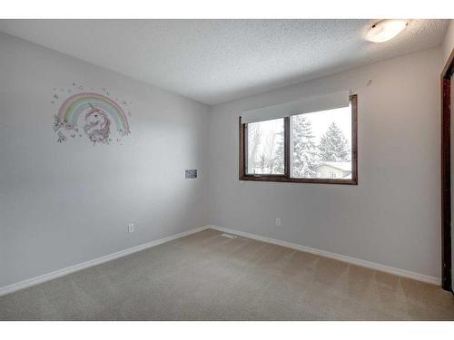 56 Deercrest Way Se, Calgary, AB - Indoor Photo Showing Other Room