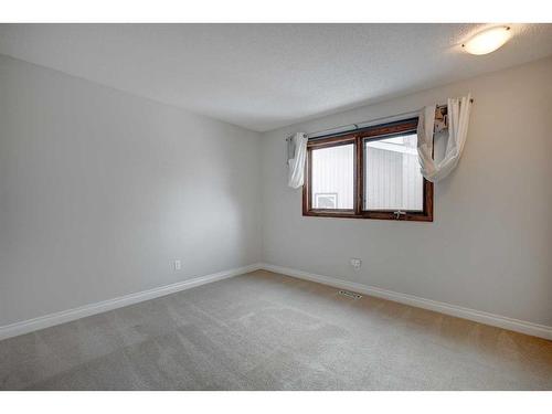 56 Deercrest Way Se, Calgary, AB - Indoor Photo Showing Other Room