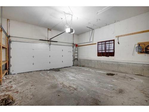 56 Deercrest Way Se, Calgary, AB - Indoor Photo Showing Garage