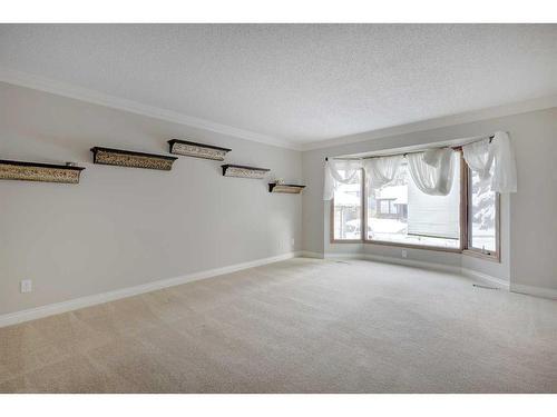 56 Deercrest Way Se, Calgary, AB - Indoor Photo Showing Other Room