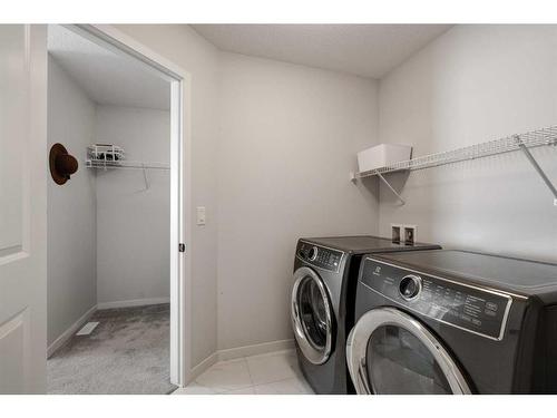 154 Cranbrook Cove, Calgary, AB - Indoor Photo Showing Laundry Room