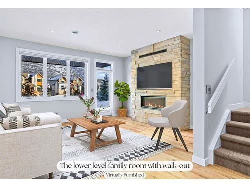 494 Stewart Creek Close, Canmore, AB - Indoor Photo Showing Living Room With Fireplace