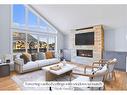 494 Stewart Creek Close, Canmore, AB  - Indoor Photo Showing Living Room With Fireplace 