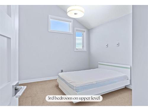 494 Stewart Creek Close, Canmore, AB - Indoor Photo Showing Bedroom