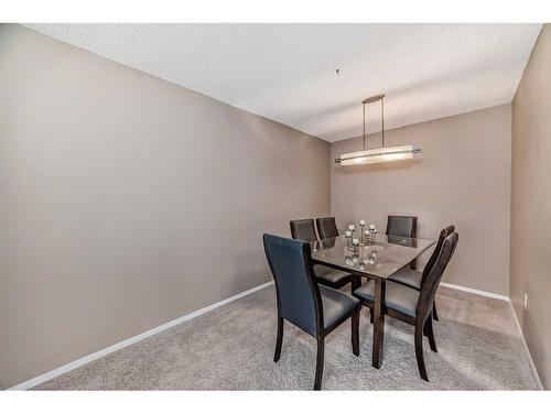 217-2425 90 Avenue Sw, Calgary, AB - Indoor Photo Showing Dining Room