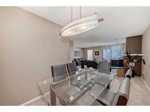 217-2425 90 Avenue Sw, Calgary, AB - Indoor Photo Showing Dining Room