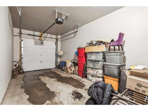 203-130 Redstone Walk Ne, Calgary, AB - Indoor Photo Showing Garage