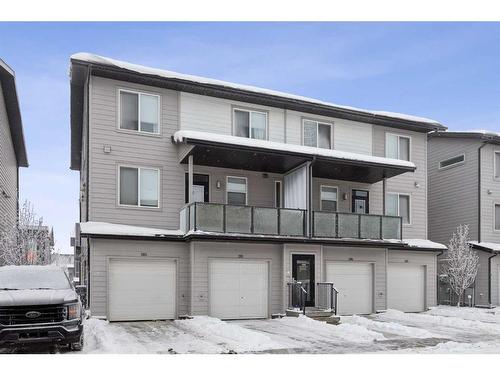 203-130 Redstone Walk Ne, Calgary, AB - Outdoor With Balcony With Facade