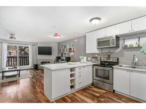 6-1032 1 Avenue Nw, Calgary, AB - Indoor Photo Showing Kitchen With Double Sink