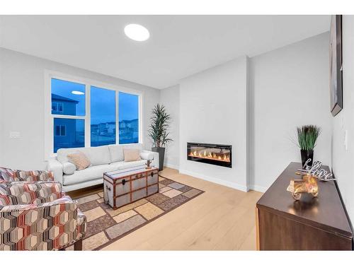 28 Cornerbrook Road Ne, Calgary, AB - Indoor Photo Showing Living Room With Fireplace