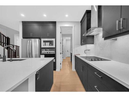 28 Cornerbrook Road Ne, Calgary, AB - Indoor Photo Showing Kitchen With Upgraded Kitchen