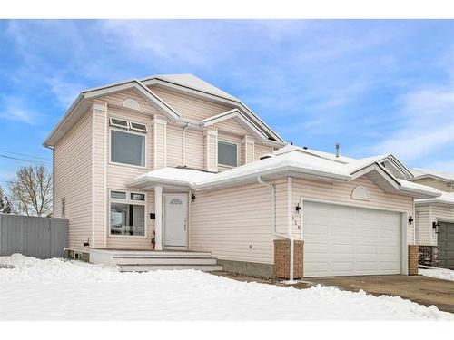 138 Riverglen Drive Se, Calgary, AB - Outdoor With Facade