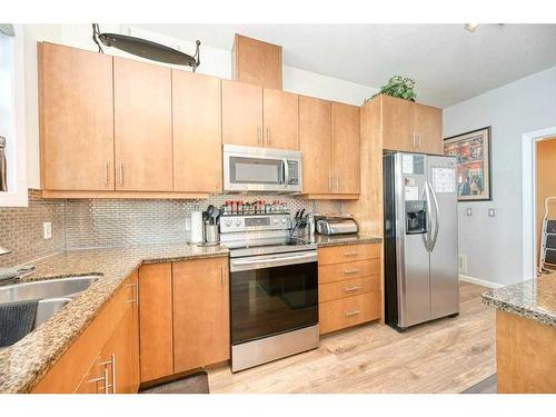 3305-210 15 Avenue Se, Calgary, AB - Indoor Photo Showing Kitchen With Double Sink