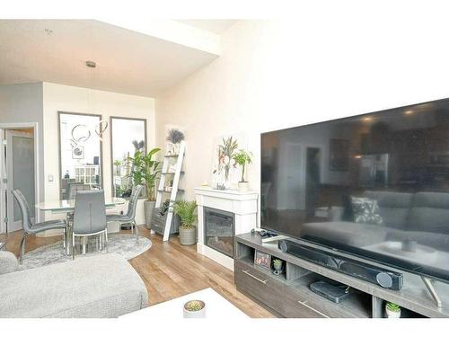 3305-210 15 Avenue Se, Calgary, AB - Indoor With Fireplace