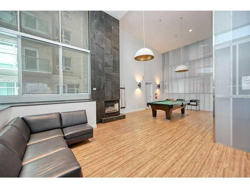 3305-210 15 Avenue Se, Calgary, AB - Indoor With Fireplace