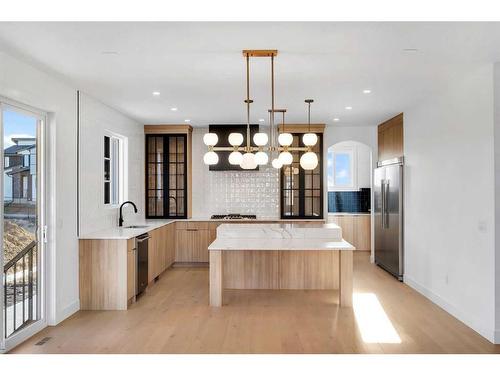 43 North Bridges Garden, Langdon, AB - Indoor Photo Showing Kitchen With Upgraded Kitchen