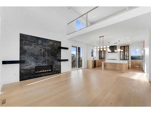 43 North Bridges Garden, Langdon, AB - Indoor Photo Showing Living Room With Fireplace