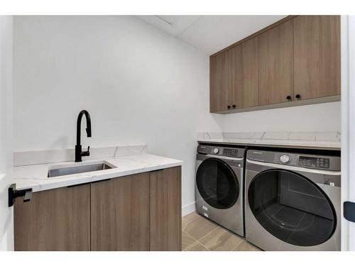 43 North Bridges Garden, Langdon, AB - Indoor Photo Showing Laundry Room