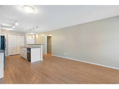 2106-700 Willowbrook Road Nw, Airdrie, AB - Indoor Photo Showing Kitchen