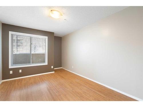 2106-700 Willowbrook Road Nw, Airdrie, AB - Indoor Photo Showing Other Room