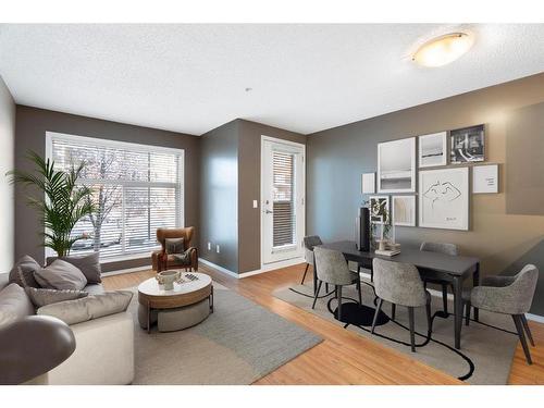 2106-700 Willowbrook Road Nw, Airdrie, AB - Indoor Photo Showing Living Room