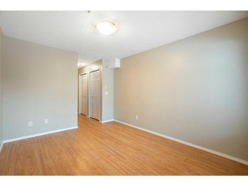 2106-700 Willowbrook Road Nw, Airdrie, AB - Indoor Photo Showing Other Room