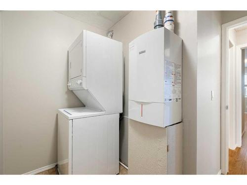 2106-700 Willowbrook Road Nw, Airdrie, AB - Indoor Photo Showing Laundry Room