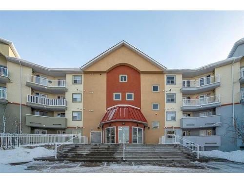 2106-700 Willowbrook Road Nw, Airdrie, AB - Outdoor With Balcony With Facade